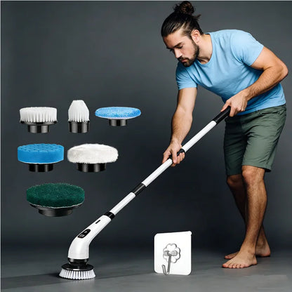 Man using an electric spin scrubber with various interchangeable cleaning brush heads.